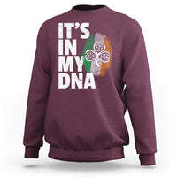 Maroon crewneck sweatshirt with “It’s in my DNA” Irish graphic on the back