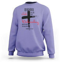 Violet crewneck sweatshirt with multicolor “Remember Ash Wednesday” cross graphic