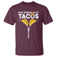 Maroon T-shirt with taco graphic and 'STOP STARING AT MY TACOS' print