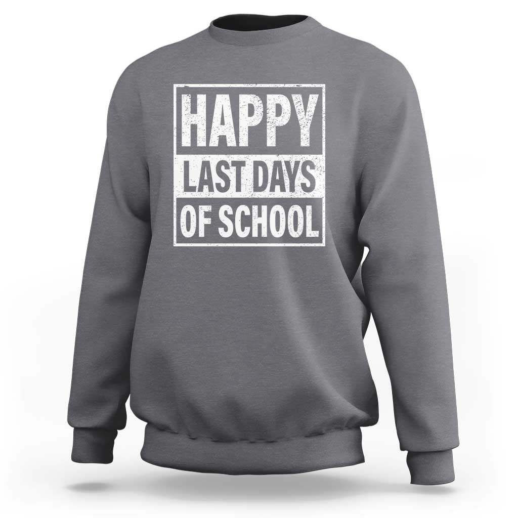 Light gray heather crewneck sweatshirt with “HAPPY LAST DAYS OF SCHOOL” graphic on front.
