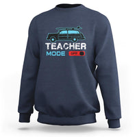 Navy crewneck sweatshirt with 'Teacher Mode' van graphic