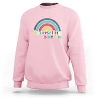Light pink sweatshirt with ribbed crew neck and front rainbow “Counseling Is My Jam” graphic