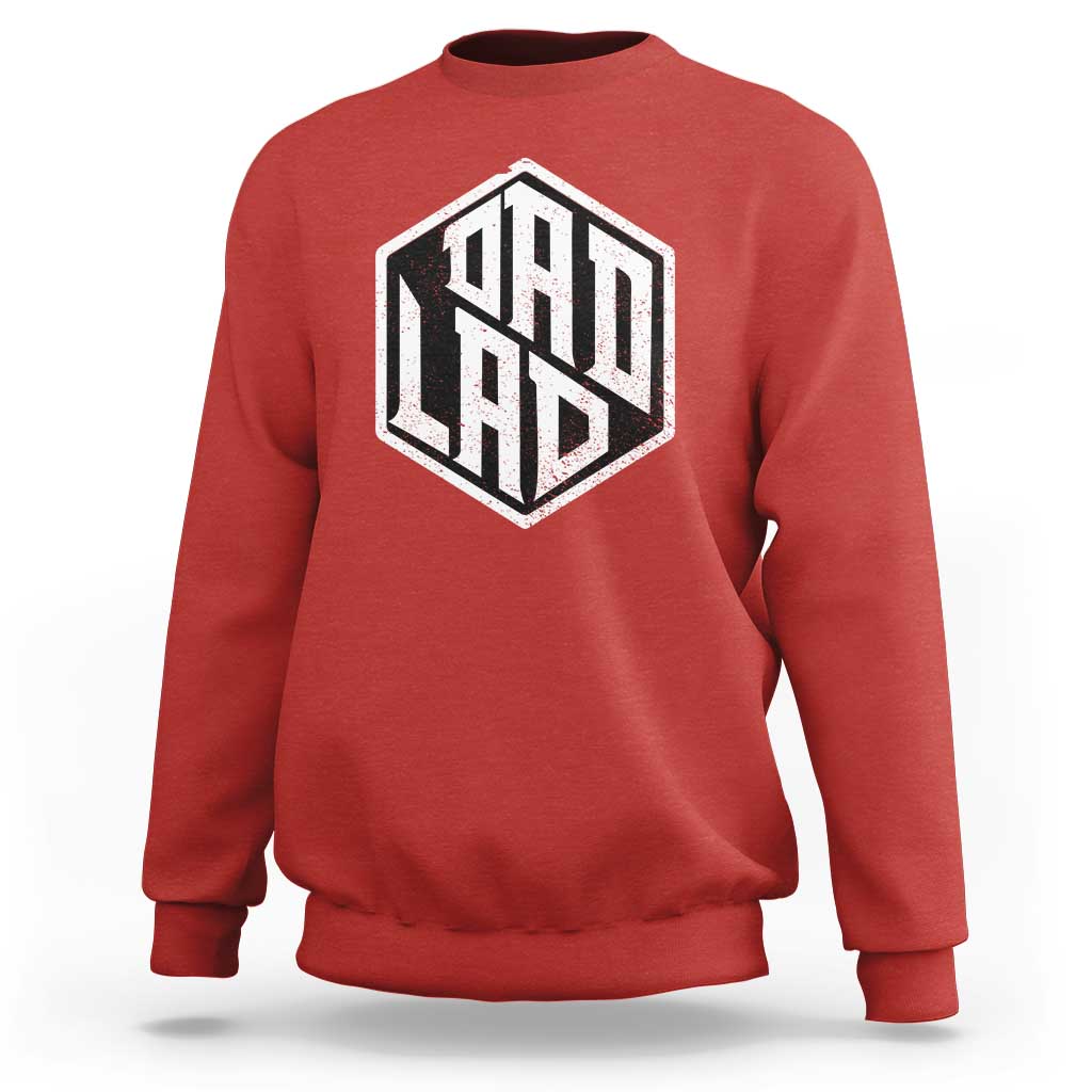 Red crewneck sweatshirt with large black “ODD LAD” graphic on the chest