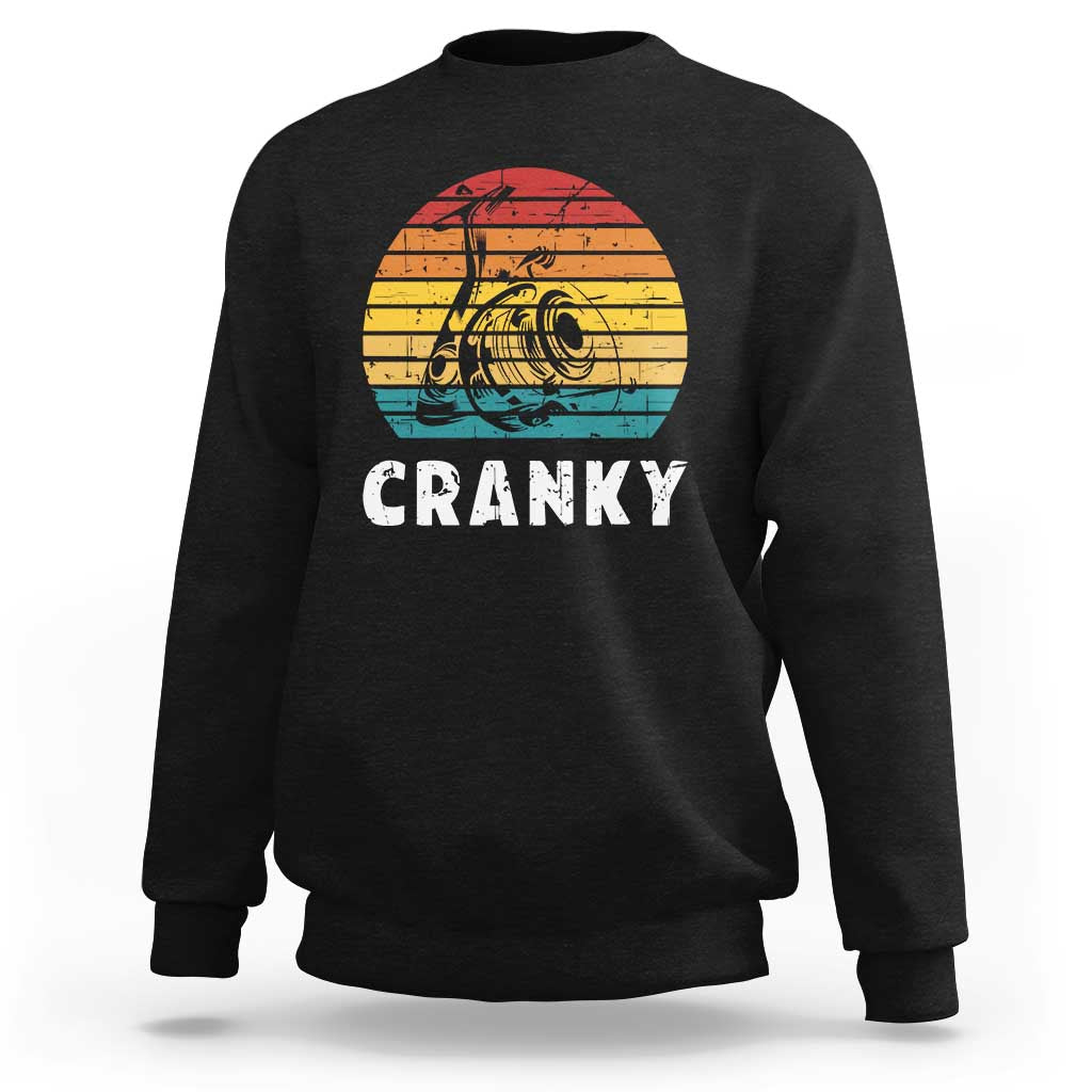 Black fishing sweatshirt with 'CRANKY' crankbait graphic on chest