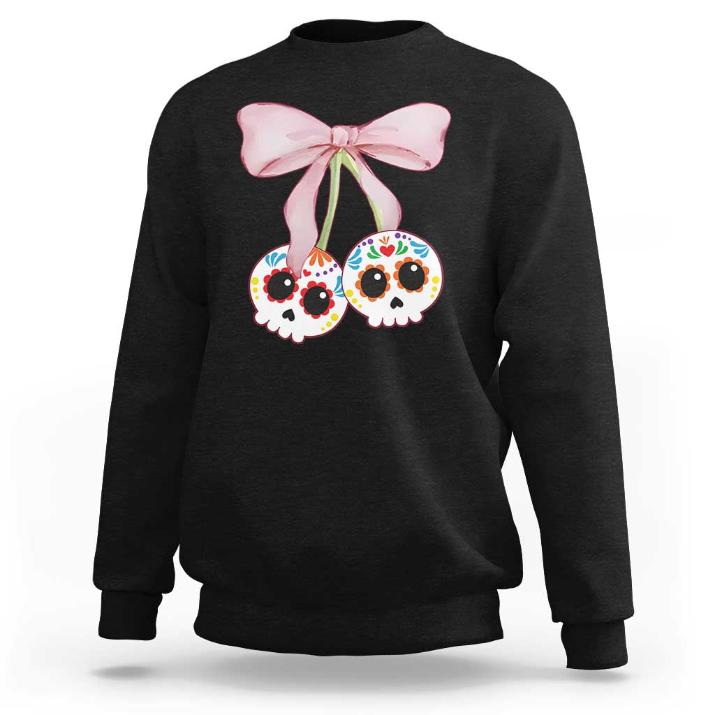 Black sweatshirt with pink bow and sugar skull graphic on chest