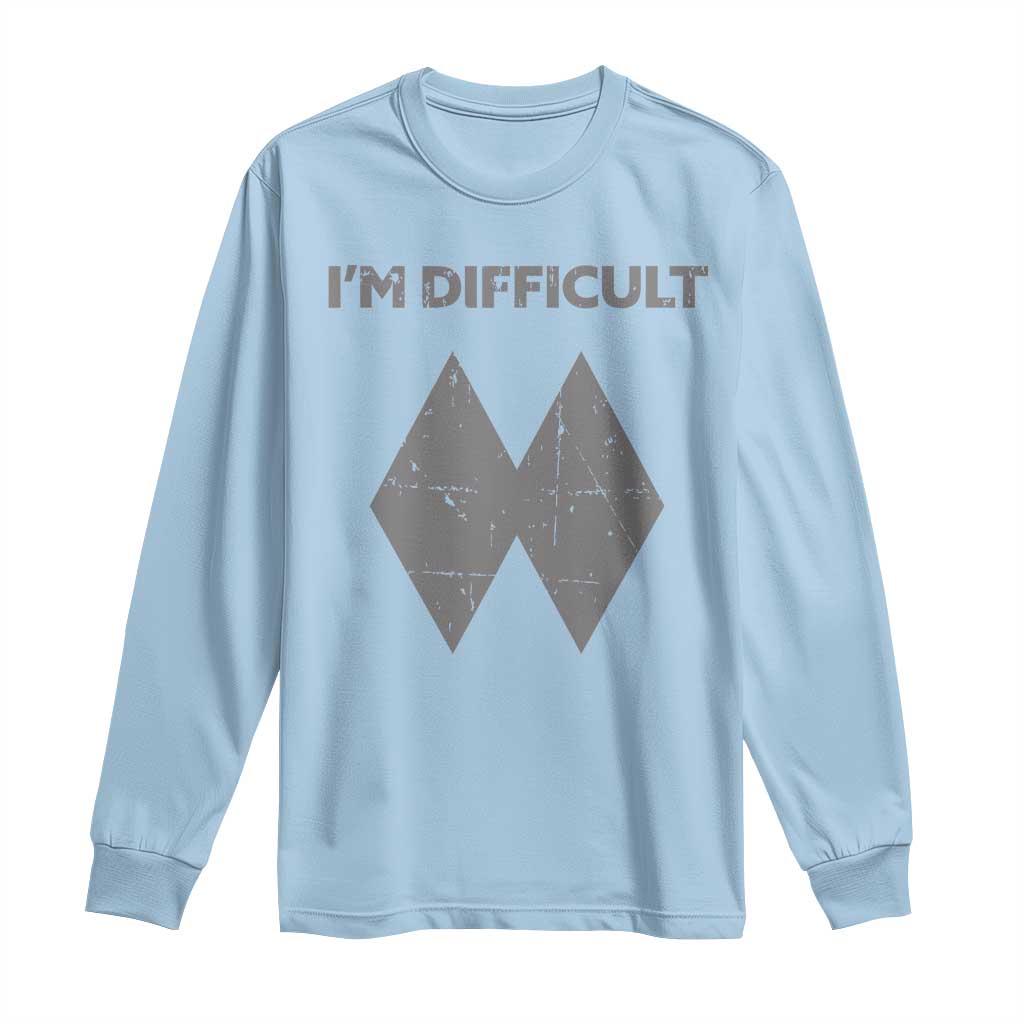 Light blue long-sleeve crewneck shirt with 'I'M DIFFICULT' text and double diamond graphic
