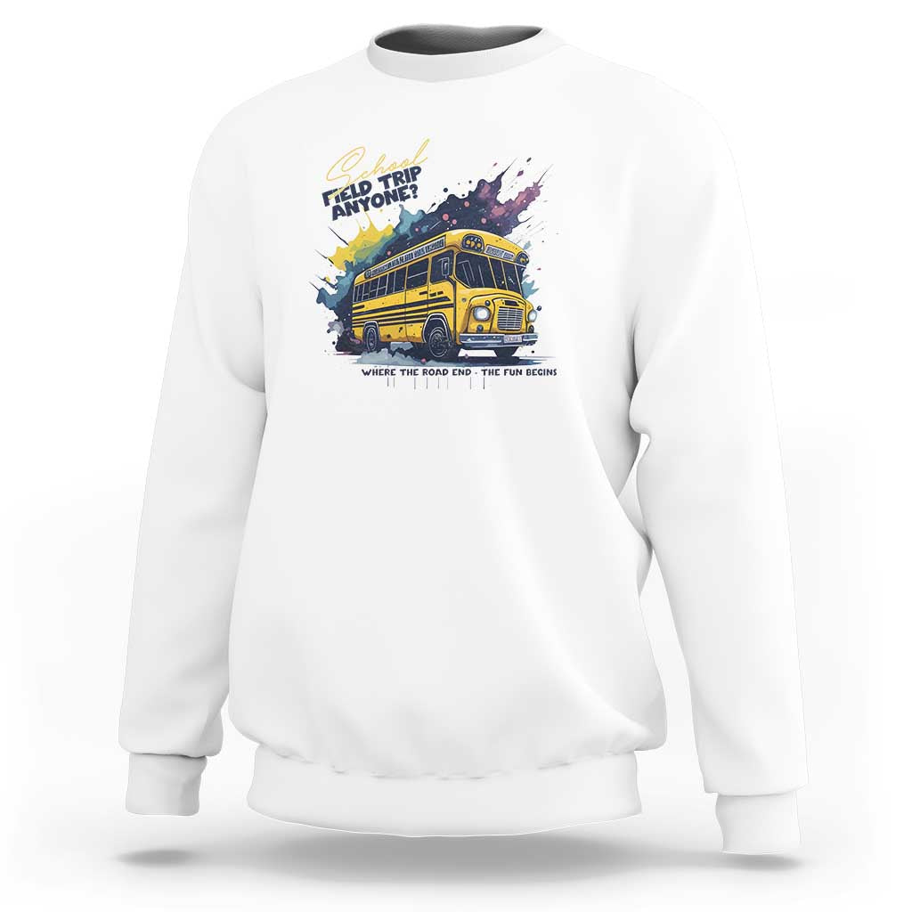 White crewneck sweatshirt with colorful bus graphic and slogan text