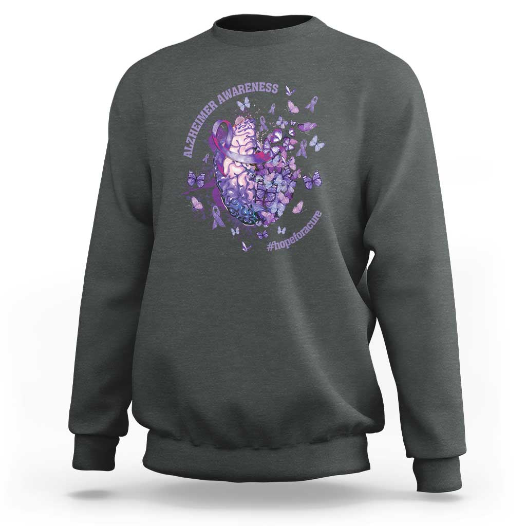 Dark gray crewneck sweatshirt with purple awareness heart-and-brain graphic and butterflies on chest