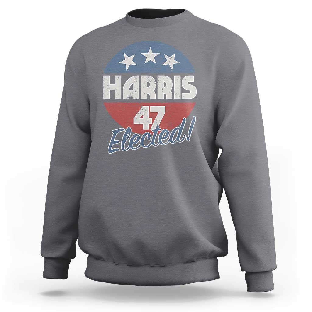 Dark heather gray crewneck sweatshirt with “Harris 4 Elected” graphic and American flag stars