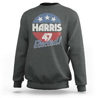 Charcoal crewneck sweatshirt with “Harris 4 Elected” graphic and American flag stars