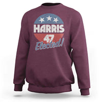 Maroon crewneck sweatshirt with “Harris 4 Elected” graphic and American flag stars