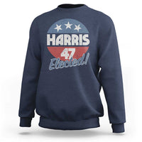 Navy crewneck sweatshirt with “Harris 4 Elected” graphic and American flag stars