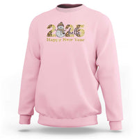 Light pink crewneck sweatshirt with snowman and fireworks graphic, 'Happy New Year' text