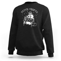 Black Halloween sweatshirt with witch craft graphic on front and long sleeves