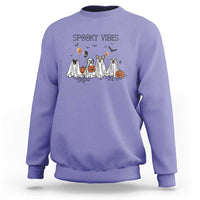 Purple Halloween sweatshirt with cartoon ghost dog and pumpkin graphic