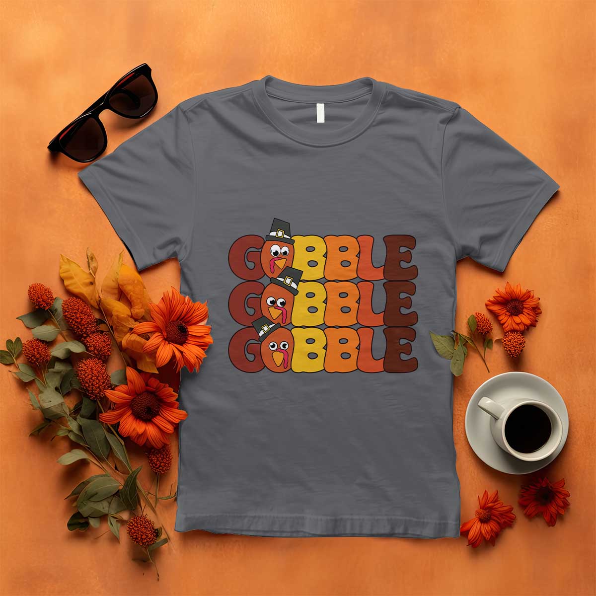 Dark gray turkey gobble graphic T-shirt with three stacked cartoon turkey faces