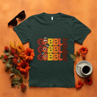 Dark green turkey gobble graphic T-shirt with three stacked cartoon turkey faces