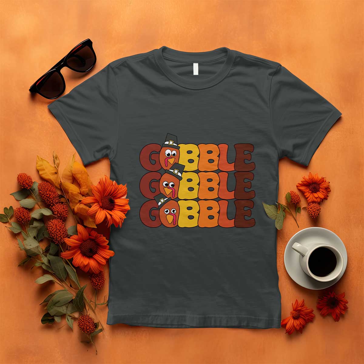 Charcoal gray turkey gobble graphic T-shirt with three stacked cartoon turkey faces