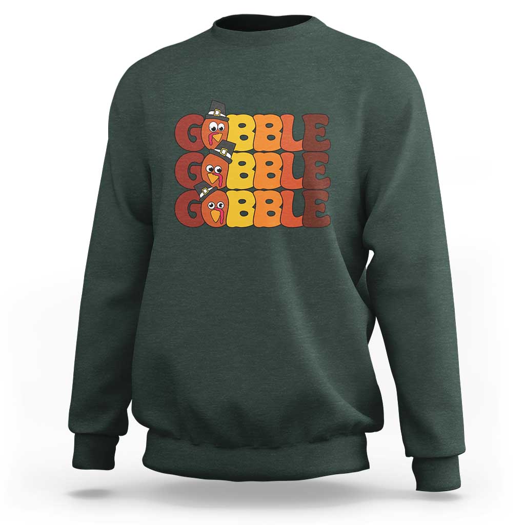 Dark green sweatshirt with "GOBBLE GOBBLE" turkey graphic on the chest