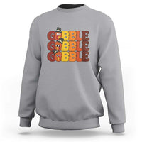 Gray sweatshirt with "GOBBLE GOBBLE" turkey graphic on the chest