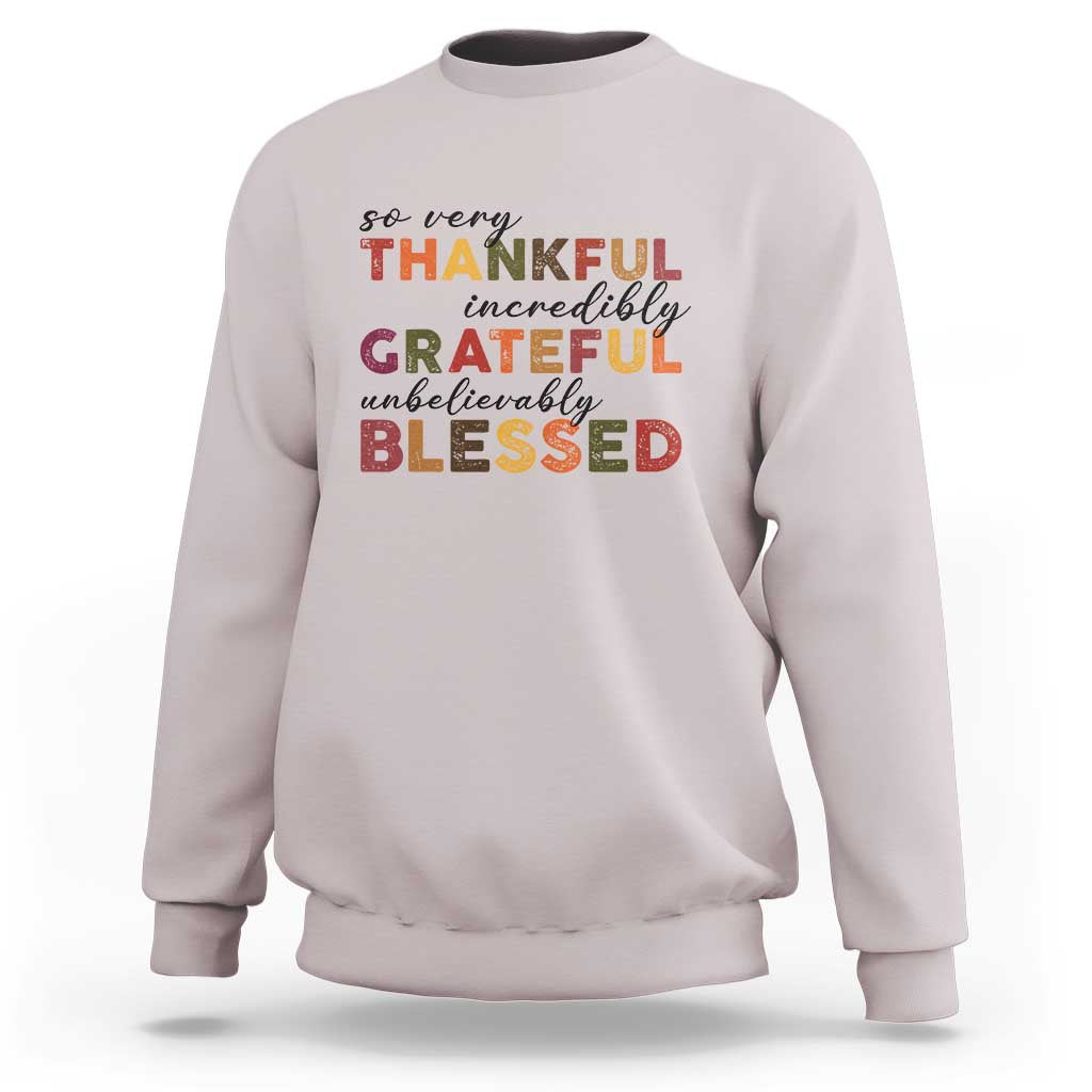 Ice gray Thanksgiving sweatshirt with multicolor “So very Thankful” text