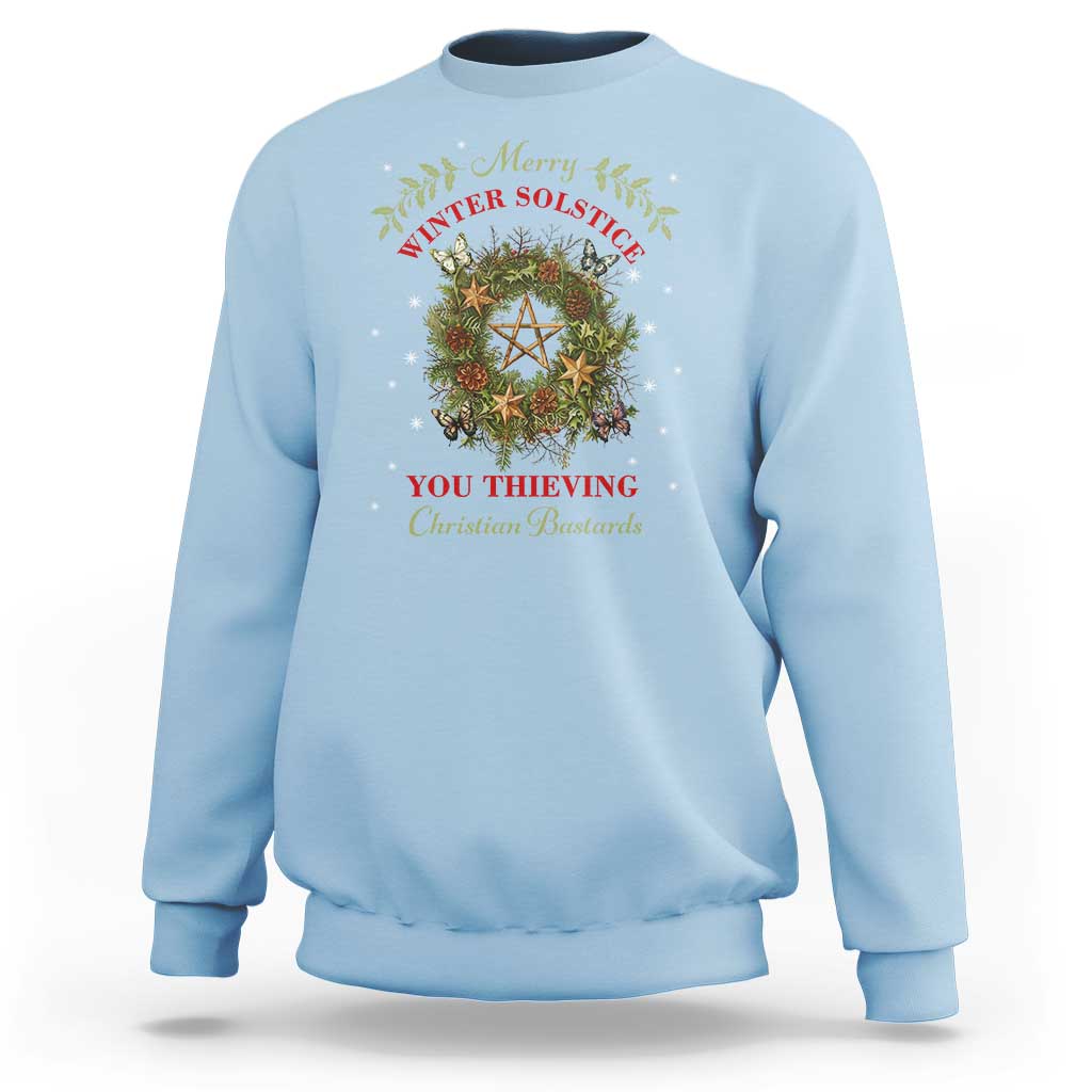 Light blue crewneck sweatshirt with holiday wreath and pentagram graphic