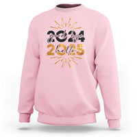 Light pink crewneck sweatshirt with “goodbye 2024 hello 2025” New Year graphic and fireworks