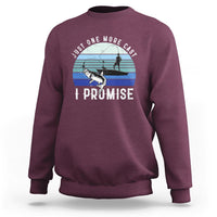 Maroon fishing sweatshirt with front hook-and-fish graphic and “I PRO MISE” text