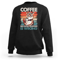 Black sweatshirt with cat holding a coffee cup graphic and bold “COFFEE” text