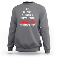 Light heather gray crewneck sweatshirt with white and red 'CANADIAN' text graphic
