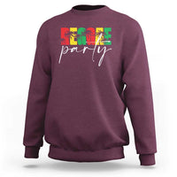Maroon crewneck sweatshirt with colorful palm tree "party" graphic on chest