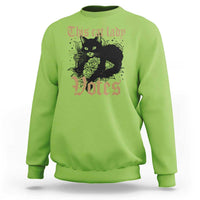 Lime green sweatshirt with cat-and-roses "Votes" graphic at center