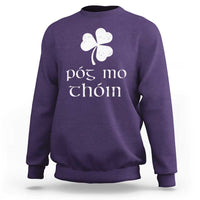 Purple sweatshirt with white shamrock and Gaelic text