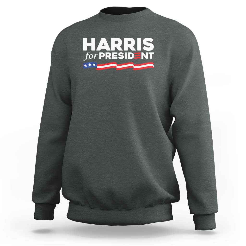 Charcoal gray sweatshirt with 'HARRIS for PRESIDENT' text and American flag graphic