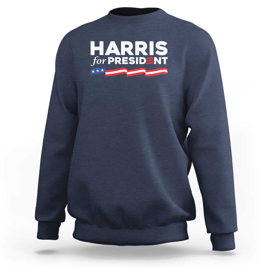 Navy sweatshirt with 'HARRIS for PRESIDENT' text and American flag graphic