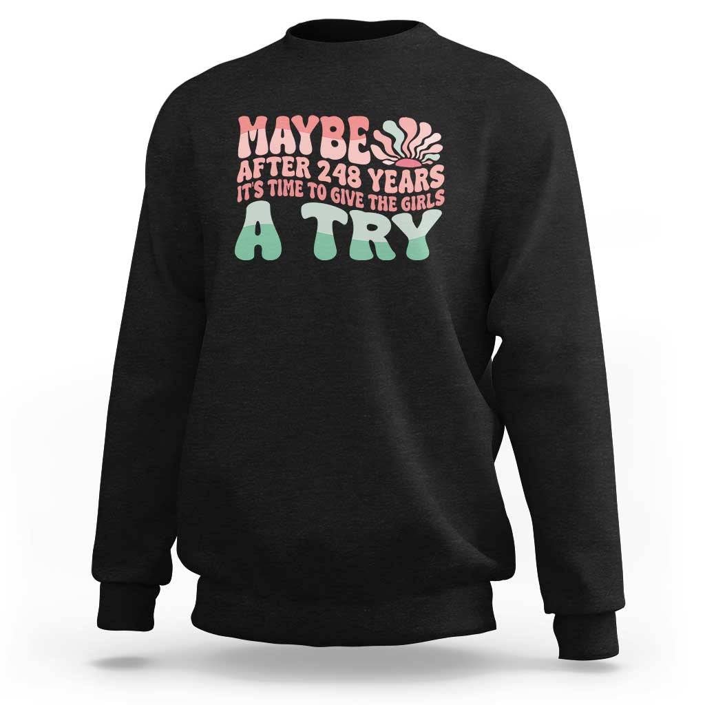 Black crewneck sweatshirt with colorful “Maybe After 248 Years… A TRY” graphic text