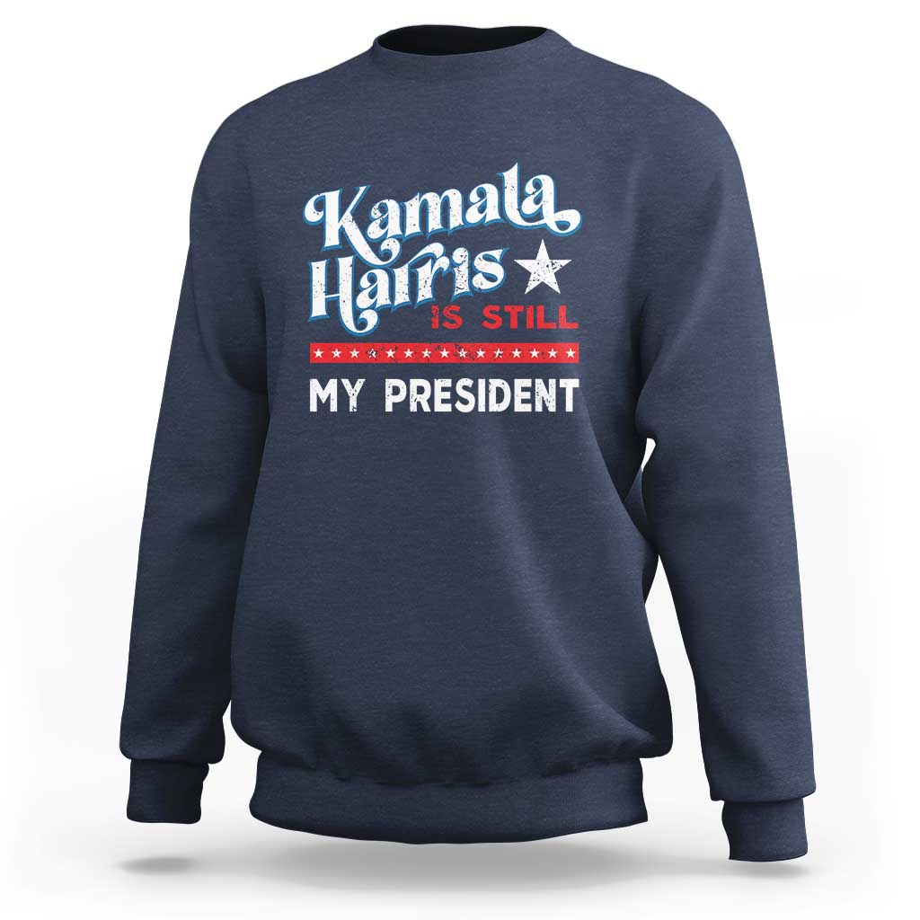 Navy crewneck sweatshirt with vintage star “Kamala Harris is still my president” print