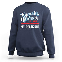 Navy crewneck sweatshirt with vintage star “Kamala Harris is still my president” print