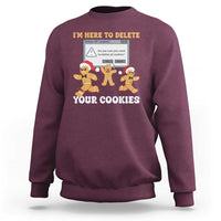 Maroon sweatshirt with gingerbread characters graphic: “I’m here to delete your cookies”.