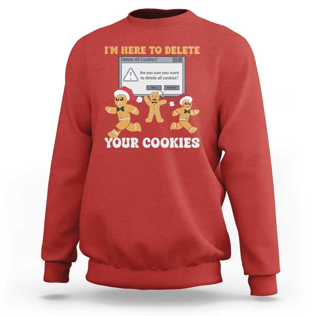 Red sweatshirt with gingerbread characters graphic: “I’m here to delete your cookies”.