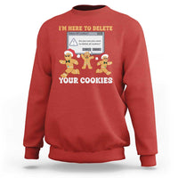Red sweatshirt with gingerbread characters graphic: “I’m here to delete your cookies”.