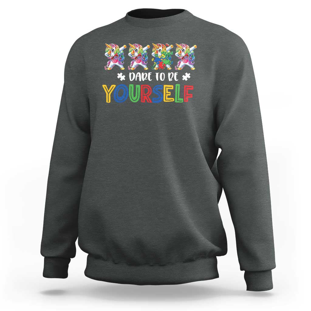 Charcoal crewneck sweatshirt with colorful unicorn graphic and “Dare to be yourself” text