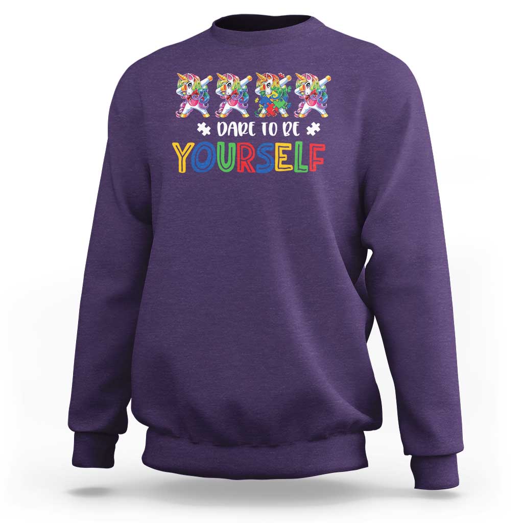Purple crewneck sweatshirt with colorful unicorn graphic and “Dare to be yourself” text