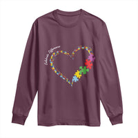 Maroon long-sleeve shirt with autism awareness heart and colorful puzzle-piece graphic