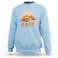 Light blue crewneck sweatshirt with golden retriever 'NOPE' front graphic