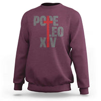 Men's maroon sweatshirt with red cross graphic and Pope lettering on chest