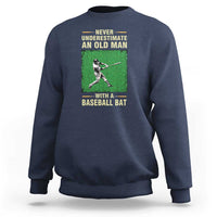 Navy men's baseball sweatshirt with back graphic of a baseball player holding a bat and slogan text