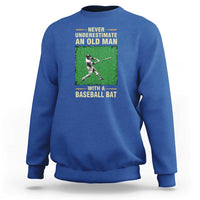Royal blue men's baseball sweatshirt with back graphic of a baseball player holding a bat