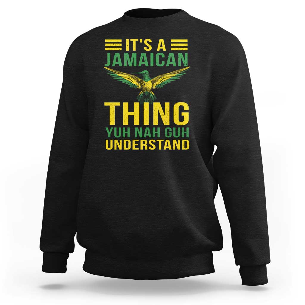Black crewneck sweatshirt with large Jamaica graphic and hummingbird on chest.