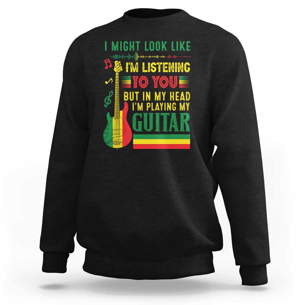 Black music graphic sweatshirt with colorful text and guitar illustration on front